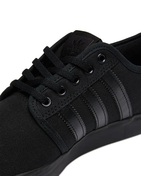 adidas in schwarz|Adidas black sneakers.